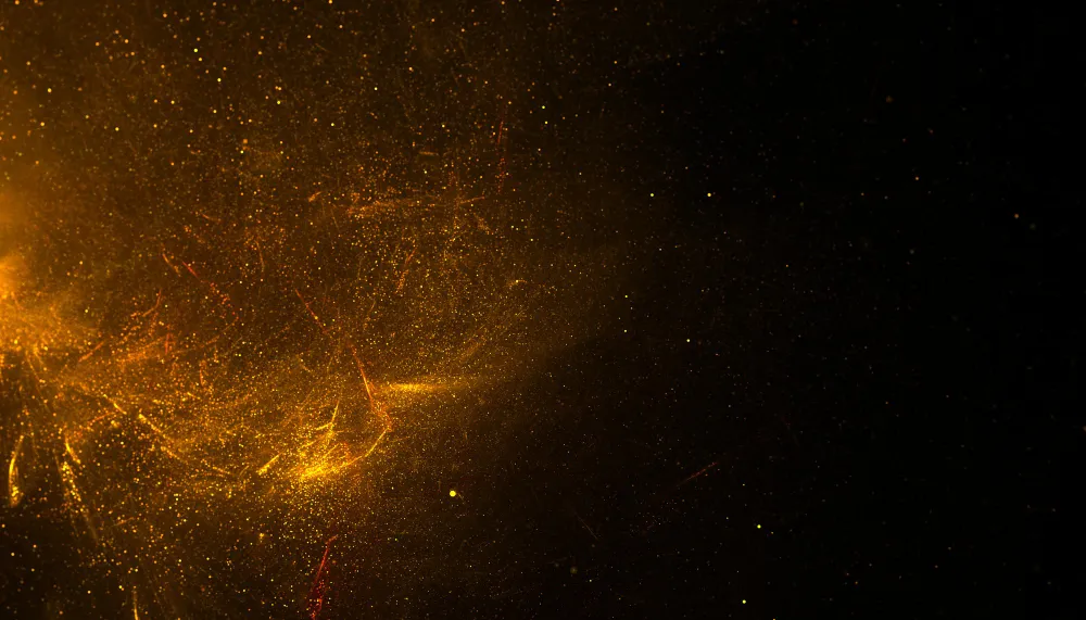 golden-glitter-powder-dust-bursting-background