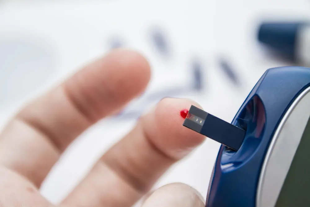 man-takes-blood-using-test-strip-checking-blood-sugar-level-by-blood-glucose-meter