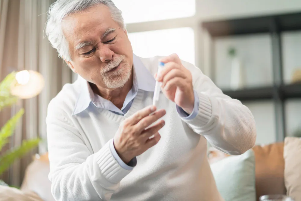 old-senior-asian-male-hand-nasal-swab-testing-rapid-tests-by-himself-detection-sars-co2-virus-home-isolate-quarantine-concept