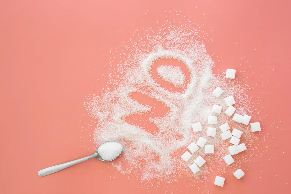 word-no-made-sugar-spoon-pink-background-flat-lay