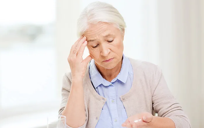 senior-woman-with-medicine