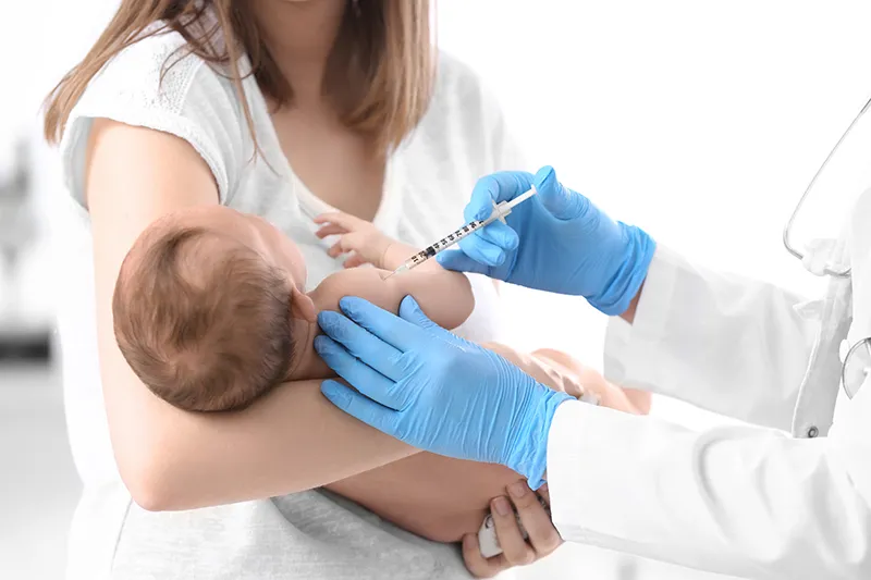 doctor-vaccinating-cute-baby-hospital