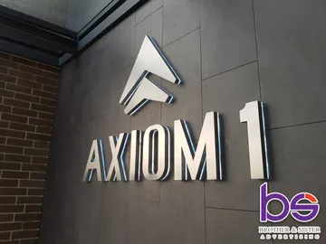 อักษรออกไฟหลังAXIOM
