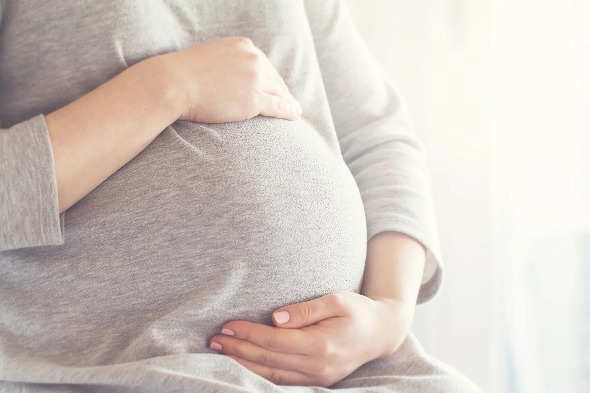 pregnant-woman-touching-her-belly