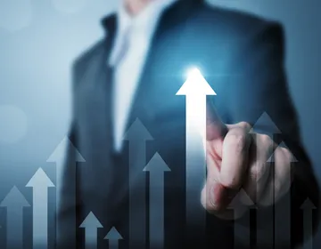 businessman-pointing-arrow-graph-corporate-future-growth-plan-increase-percentage