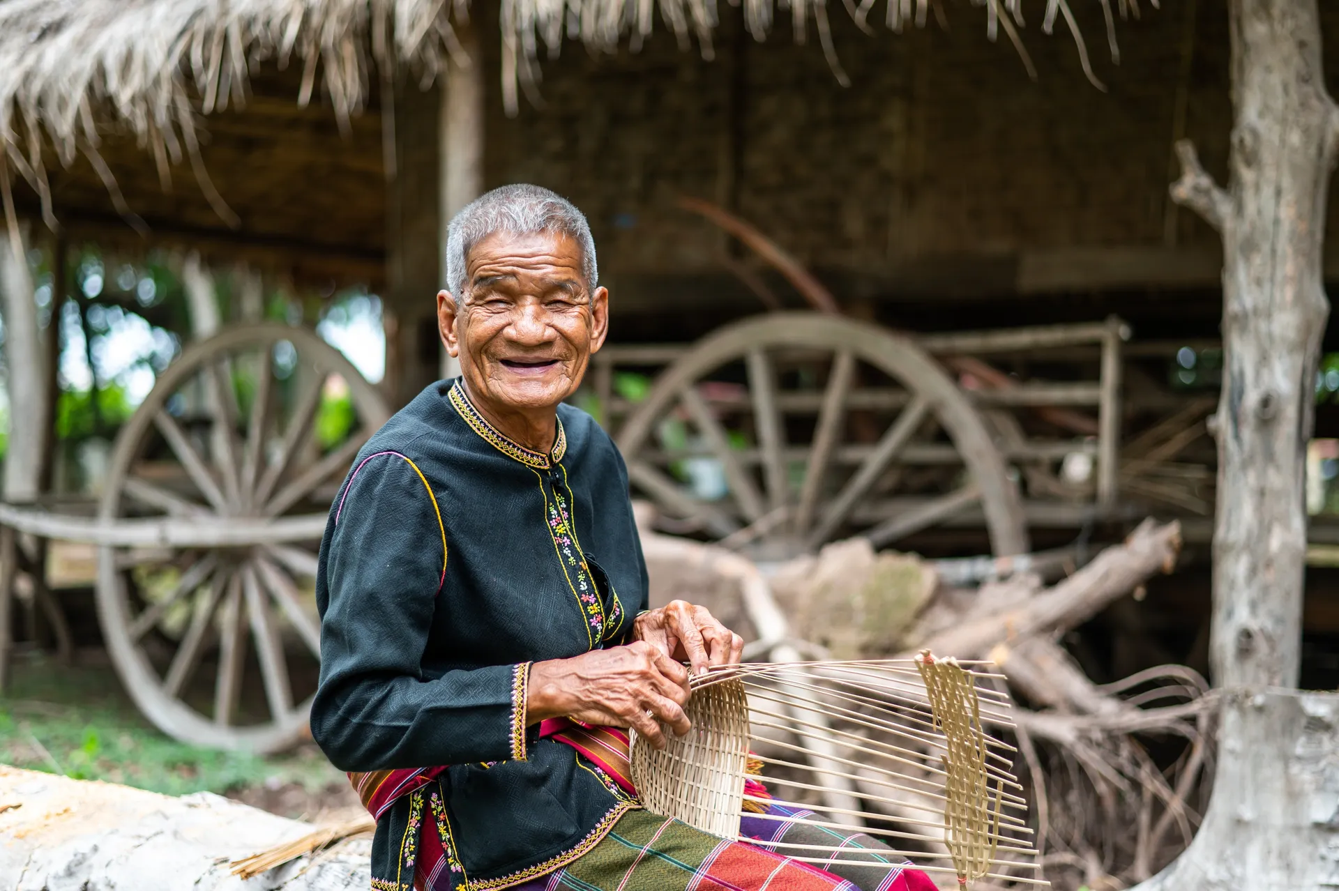 Native-NortheasterntribemenhandmakingtropicalbamboointraditionalcraftsvillageinThailandshutterstock2317369253copy