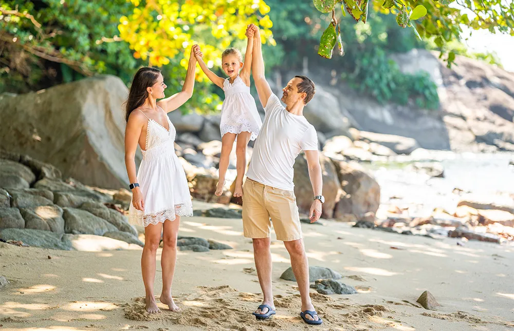 happy-young-family-three-taking-walk-beach-having-fun-seashore-shade