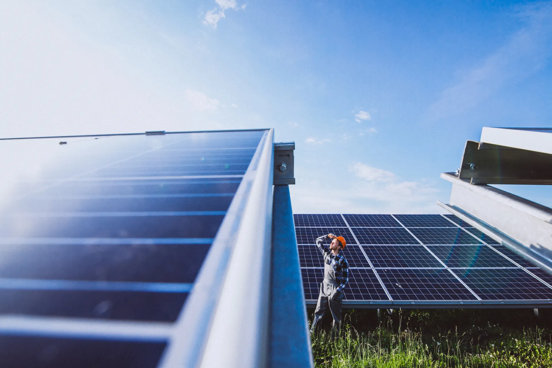 man-worker-firld-by-solar-panels