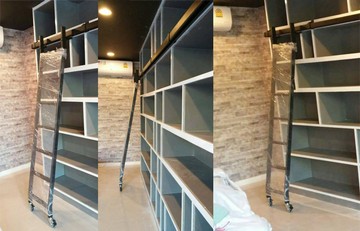 บันไดรางเลื่อนชั้นวางหนังสือบ้านคุณสุวัจ