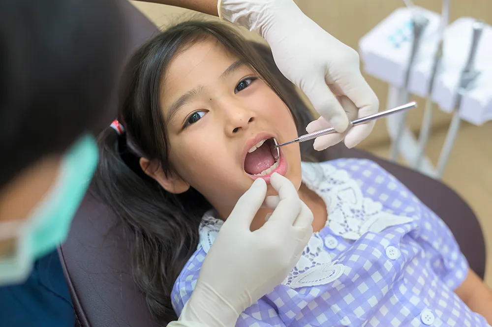 little-cute-girl-having-teeth-examined-by-dentist-dental-clinic-teeth-checkup-healthy-teeth-concept