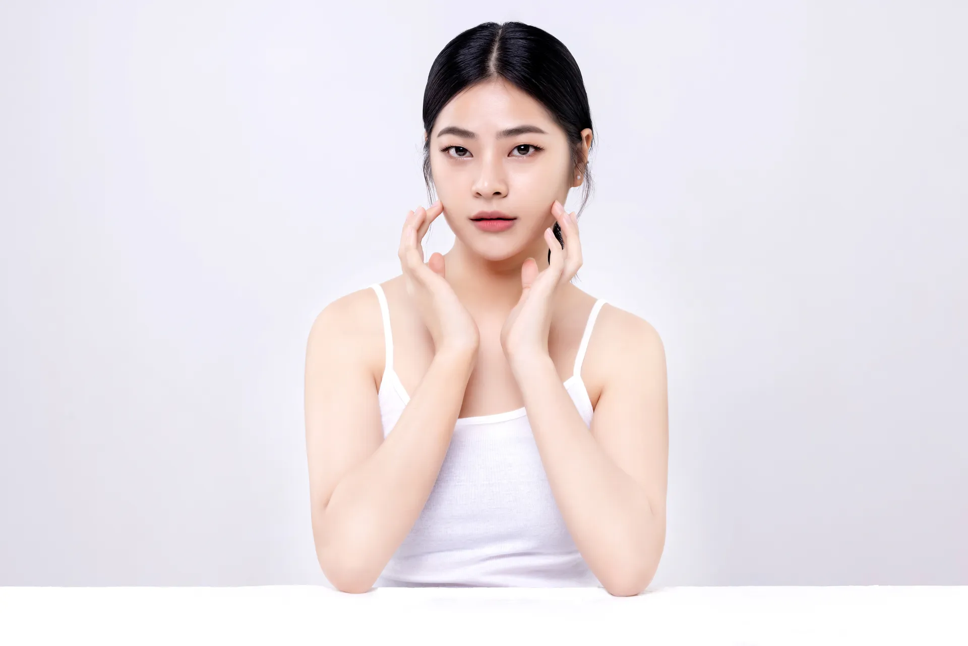 studio-shot-beautiful-young-asian-woman-with-clean-fresh-skin-white-background-face-care-facial-treatment-cosmetology-beauty-spa