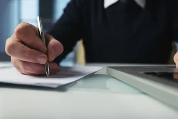 cropped-unrecognizable-man-checking-contract