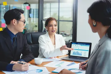 group-asian-business-people-meeting-about-business-plan-present-explain-stock-financial