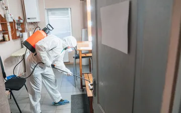 Cleaning-Services13357901568240000coronavirus-pandemic-disinfector-protective-suit-mask-sprays-disinfectants-house-