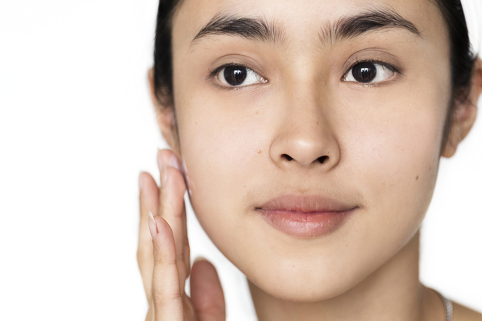 portrait-white-woman-doing-her-daily-skincare-routine